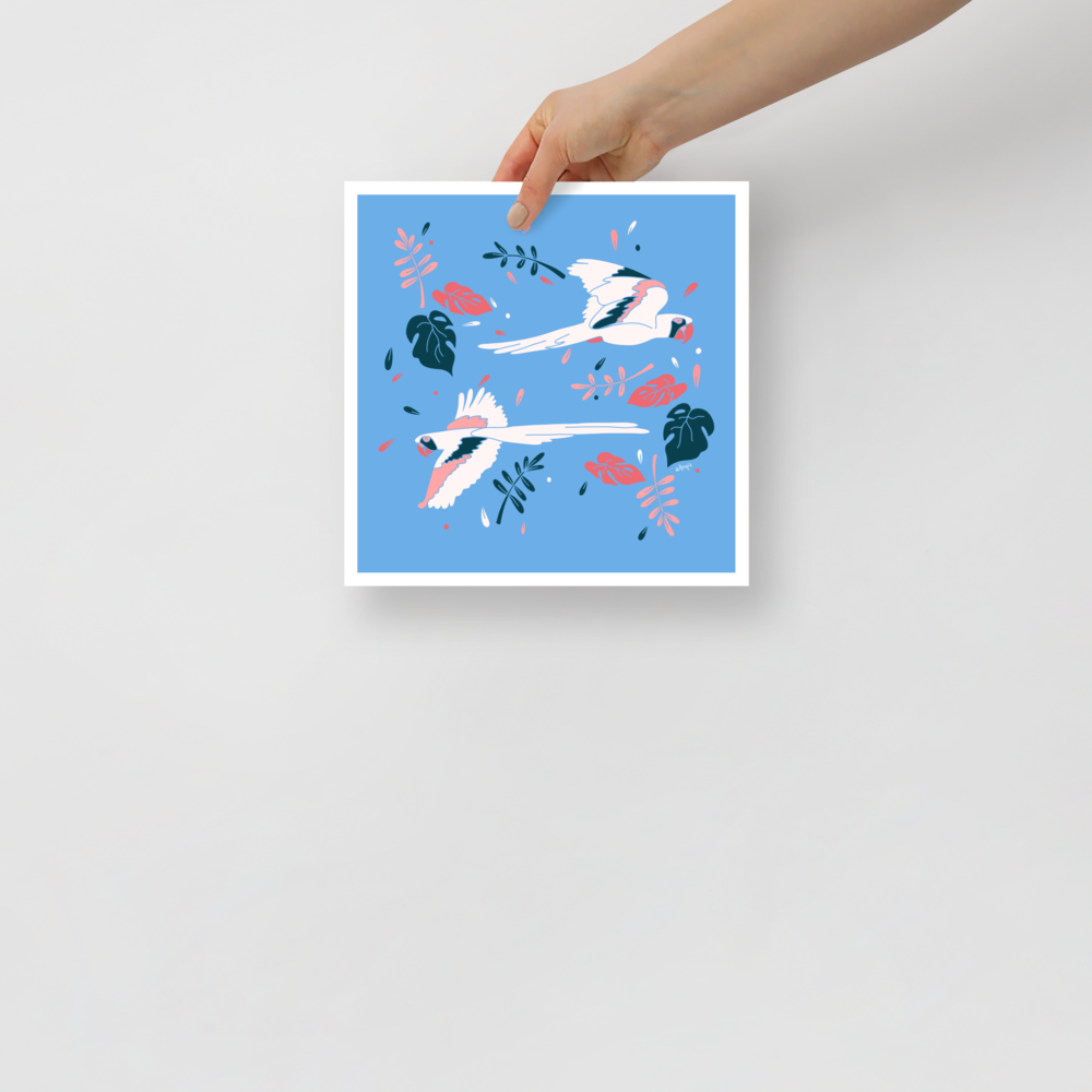 Parrots flying across light blue Poster