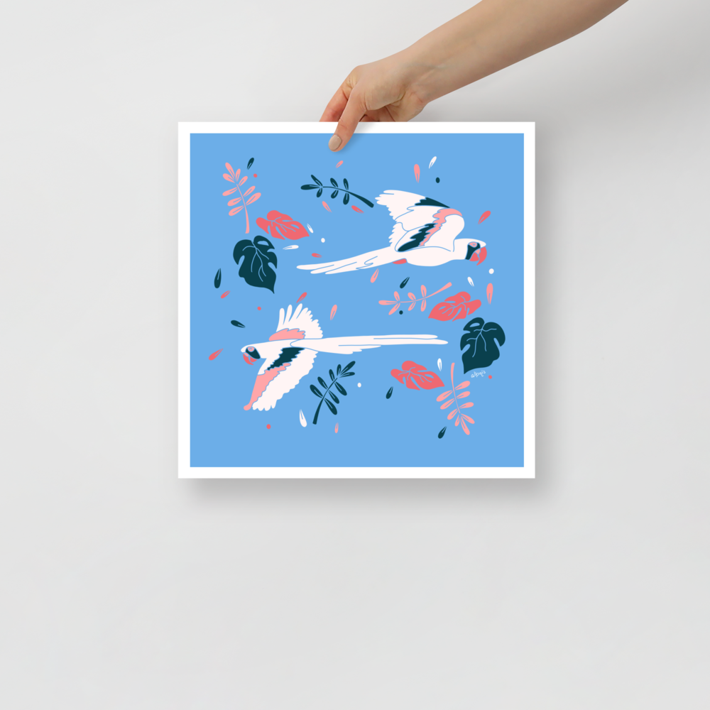 Parrots flying across light blue Poster